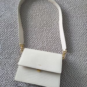 JW PEI Cream Crossbody Bag with Gold Accents